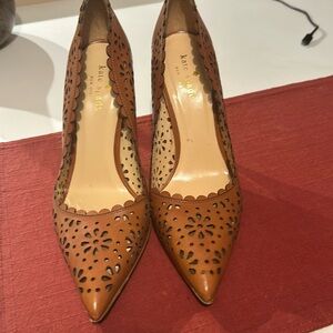 Kate Spade Lana Cutout Flower pumps.